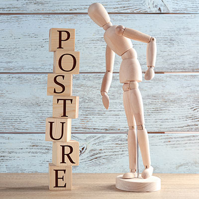 posture model and letter blocks spelling posture