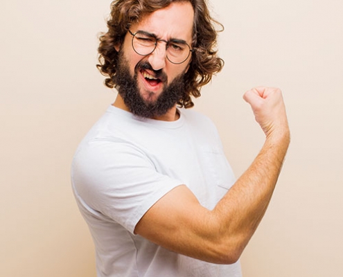 Man flexing arm muscle